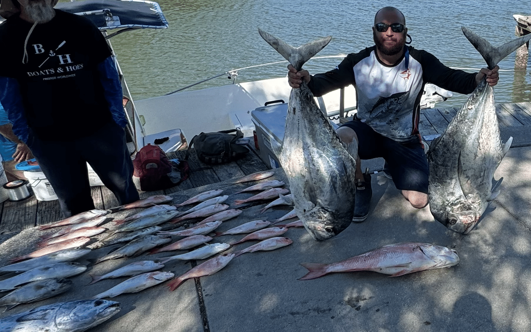 Beast Coast Fishing Charters Fishermen with large catch of fish